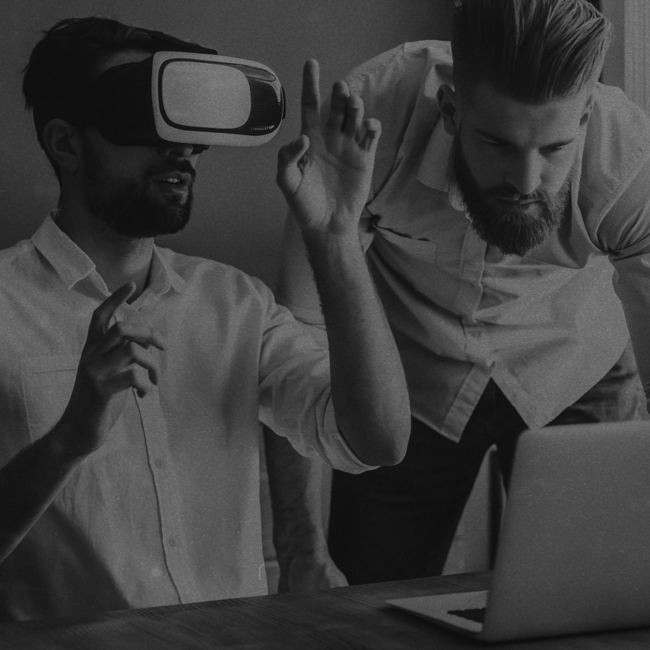 Co-workers testing VR equipment.